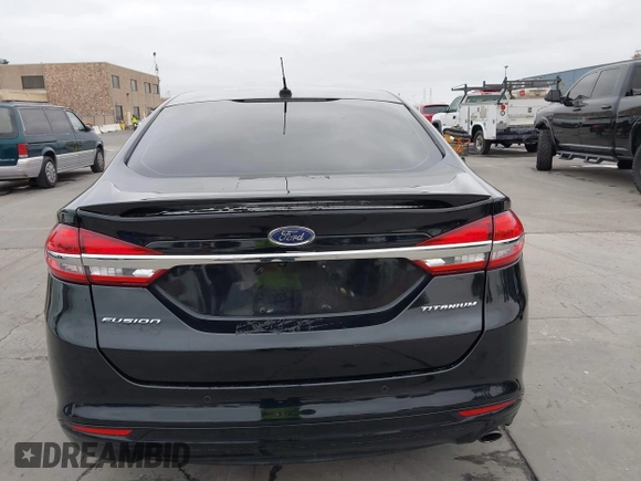 2017 Ford Fusion Titanium with VIN 3FA6P0SUXHR110304, listed as a IAAI auction lot 42119565 with 118,706 mi miles and . Bid and sale history available at DreamBid. Image 16.