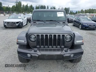 2021 Jeep Gladiator High Altitude with VIN 1C6HJTFG8ML567087, listed as a IAAI auction lot 42549990 with 30,437 mi miles and . Bid and sale history available at DreamBid. Image 13.