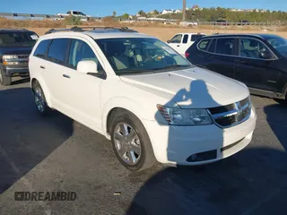 2009 Dodge Journey R/T with VIN 3D4GH67V09T148132, listed as a IAAI auction lot 40926911 with 207,179 mi miles. Bid and sale history available at carsss.com. Image 1.