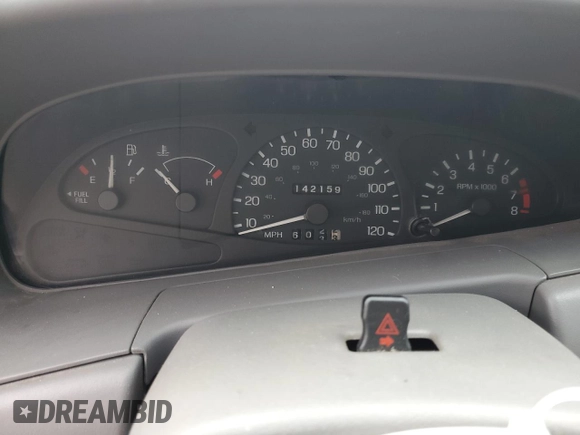1998 Ford Escort ZX2 Cool z VIN 3FAKP1131WR224797, wystawiony jako Copart lot #87968445 z przebiegiem 142 159 mil mil oraz Szkoda całkowita • Salvage title. Historia ofert i sprzedaży dostępna na DreamBid. Obrazek 9.