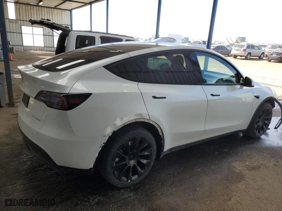 2023 Tesla Model Y Long Range with VIN 7SAYGDEE2PA050503, listed as a Copart auction lot 49387595 with 31,106 mi miles and Salvage Title. Bid and sale history available at carsss.com. Image 3.