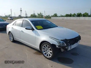 2016 Cadillac CTS AWD with VIN 1G6AW5SX4G0120696, listed as a IAAI auction lot 42169466 with 109,436 mi miles and . Bid and sale history available at DreamBid. Image 1.