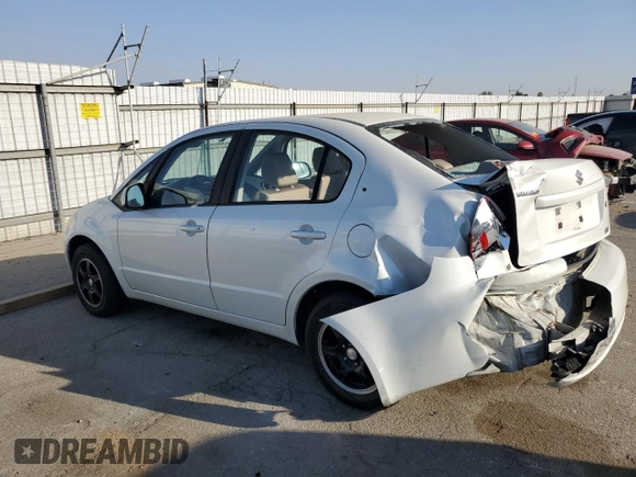 2009 Suzuki SX4 Man FWD with VIN JS2YC412796200908, listed as a Copart auction lot 73821924 with 125,721 mi miles and Salvage Title. Bid and sale history available at carsss.com. Image 2.