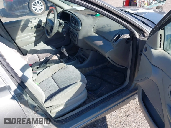 1999 Ford Contour SE Fleet z VIN 1FAFP66L7XK115659, wystawiony jako IAAI lot #42142065 z przebiegiem 161 018 mil mil oraz . Historia ofert i sprzedaży dostępna na DreamBid. Obrazek 5.