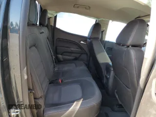 2017 GMC Canyon z VIN 1GTP6CE1XH1252005, wystawiony jako Copart lot #74982794 z przebiegiem 62 797 mil mil oraz Szkoda całkowita • Salvage title. Historia ofert i sprzedaży dostępna na DreamBid. Obrazek 10.