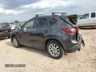 2015 Mazda CX-5 Touring with VIN JM3KE4CY0F0517821, listed as a Copart auction lot 53937195 with 165,852 mi miles and Salvage Title. Bid and sale history available at DreamBid. Image 2.