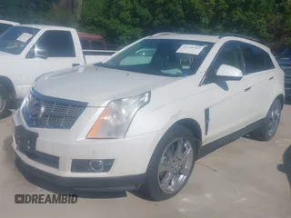 2011 Cadillac SRX Premium Collection z VIN 3GYFNCEYXBS579760, wystawiony jako IAAI lot #42238707 z przebiegiem Nie podano mil oraz . Historia ofert i sprzedaży dostępna na DreamBid. Obrazek 2.