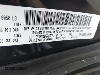 2012 Chrysler Town & Country Touring with VIN 2C4RC1BG7CR301101, listed as a IAAI auction lot 42173814 with 141,128 mi miles. Bid and sale history available at carsss.com. Image 9.