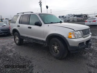 2003 Ford Explorer XLT z VIN 1FMZU73W13ZA42256, wystawiony jako IAAI lot #41234031 z przebiegiem Nie podano mil oraz . Historia ofert i sprzedaży dostępna na DreamBid. Obrazek 1.