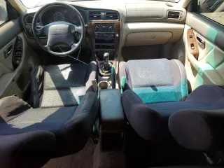 2002 Subaru Legacy Outback Limited with VIN 4S3BH686526640136, listed as a Copart auction lot 58624045 with 253,182 mi miles and Salvage title. Bid and sale history available at DreamBid. Image 8.