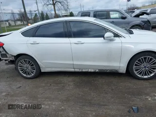2015 Ford Fusion SE with VIN 3FA6P0H9XFR181132, listed as a IAAI auction lot 41075635 with 216,089 mi miles and . Bid and sale history available at DreamBid. Image 14.