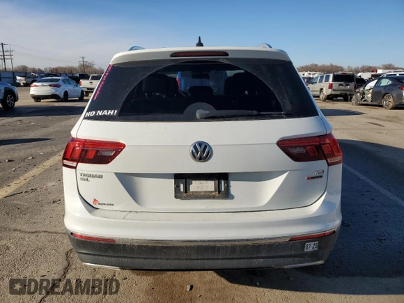 2018 Volkswagen Tiguan SEL z VIN 3VV2B7AX0JM017033, wystawiony jako Copart lot #85799204 z przebiegiem 64 075 mil mil oraz Szkoda całkowita • Salvage title. Historia ofert i sprzedaży dostępna na DreamBid. Obrazek 6.