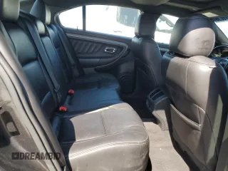 2017 Ford Taurus SEL z VIN 1FAHP2E85HG130308, wystawiony jako Copart lot #56376635 z przebiegiem 123 985 mil mil oraz Czysty tytuł • Clean title. Historia ofert i sprzedaży dostępna na DreamBid. Obrazek 10.