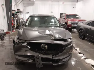 2017 Mazda CX-5 Grand Touring with VIN JM3KFADLXH0151593, listed as a IAAI auction lot 41823378 with 149,299 mi miles. Bid and sale history available at carsss.com. Image 12.