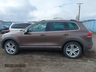 2013 Volkswagen Touareg Lux with VIN WVGEF9BP1DD012851, listed as a IAAI auction lot 41732391 with 123,283 mi miles and . Bid and sale history available at DreamBid. Image 15.