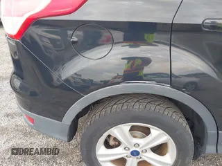 2014 Ford Escape SE with VIN 1FMCU9GX2EUB68419, listed as a IAAI auction lot 42741491 with Not provided miles and . Bid and sale history available at DreamBid. Image 13.