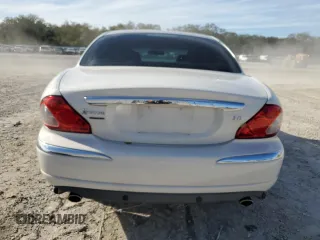2007 Jaguar X-Type z VIN SAJWA51A67WJ24665, wystawiony jako Copart lot #86817544 z przebiegiem 52 027 mil mil oraz Szkoda całkowita • Salvage title. Historia ofert i sprzedaży dostępna na DreamBid. Obrazek 6.