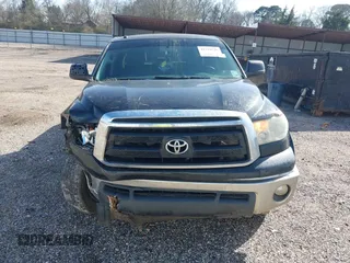 2013 Toyota Tundra 4WD Truck with VIN 5TFDW5F17DX275780, listed as a IAAI auction lot 41710728 with 160,298 mi miles. Bid and sale history available at carsss.com. Image 13.