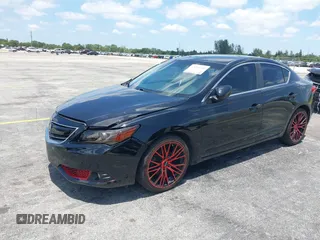 2013 Acura ILX Technology z VIN 19VDE1F72DE014291, wystawiony jako IAAI lot #42221550 z przebiegiem 134 825 mil mil oraz . Historia ofert i sprzedaży dostępna na DreamBid. Obrazek 2.
