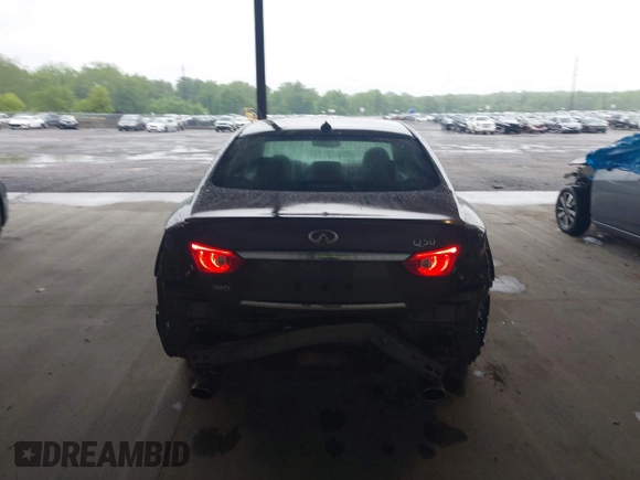 2015 Infiniti Q50 Premium z VIN JN1BV7AR0FM393387, wystawiony jako IAAI lot #42257850 z przebiegiem 176 436 mil mil oraz . Historia ofert i sprzedaży dostępna na DreamBid. Obrazek 16.
