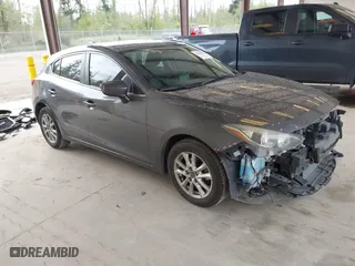 2014 Mazda Mazda3 i Touring with VIN JM1BM1L71E1193465, listed as a IAAI auction lot 42078287 with 144,014 mi miles. Bid and sale history available at carsss.com. Image 1.