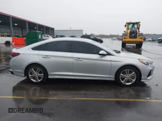 2018 Hyundai Sonata SEL with VIN 5NPE34AF0JH696872, listed as a IAAI auction lot 41070305 with 121,000 mi miles and . Bid and sale history available at DreamBid. Image 13.