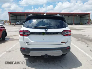 2024 Honda Pilot TrailSport z VIN 5FNYG1H6XRB004763, wystawiony jako IAAI lot #42237606 z przebiegiem 14 819 mil mil oraz . Historia ofert i sprzedaży dostępna na DreamBid. Obrazek 16.