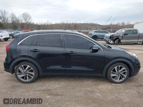 2017 Kia Niro Touring with VIN KNDCE3LC0H5040261, listed as a IAAI auction lot 41751900 with 100,194 mi miles. Bid and sale history available at carsss.com. Image 13.