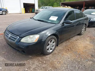 2003 Nissan Altima S with VIN 1N4AL11D03C165042, listed as a IAAI auction lot 41888473 with 306,629 mi miles. Bid and sale history available at carsss.com. Image 2.