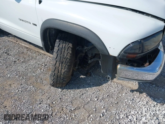 2000 Dodge Dakota z VIN 1B7GL22X1YS740359, wystawiony jako IAAI lot #42430964 z przebiegiem 213 435 mil mil oraz . Historia ofert i sprzedaży dostępna na DreamBid. Obrazek 12.