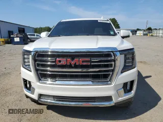 2021 GMC Yukon SLT with VIN 1GKS1BKT0MR425247, listed as a Copart auction lot 69205584 with 72,952 mi miles and Salvage Title. Bid and sale history available at carsss.com. Image 5.