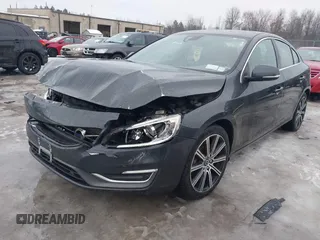2015 Volvo S60 T5 Premier z VIN YV1612TK3F1359338, wystawiony jako IAAI lot #41645209 z przebiegiem 106 822 mil mil oraz . Historia ofert i sprzedaży dostępna na DreamBid. Obrazek 17.