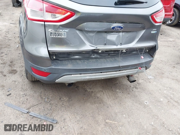 2014 Ford Escape SE with VIN 1FMCU9GX8EUA65568, listed as a IAAI auction lot 42435114 with 128,278 mi miles and . Bid and sale history available at DreamBid. Image 6.