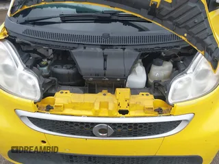 2014 Smart fortwo Pure z VIN WMEEJ3BA0EK738873, wystawiony jako IAAI lot #41993948 z przebiegiem 88 946 mil mil oraz . Historia ofert i sprzedaży dostępna na DreamBid. Obrazek 10.