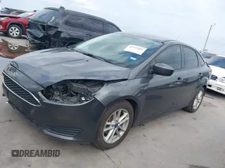 2018 Ford Focus SE with VIN 1FADP3F22JL295342, listed as a IAAI auction lot 42335881 with 77,464 mi miles and . Bid and sale history available at DreamBid. Image 18.