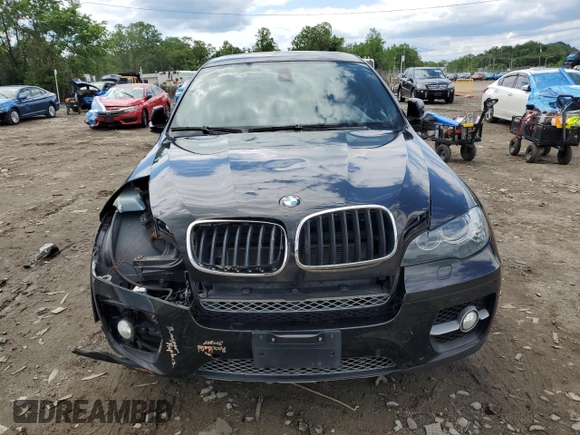 2012 BMW X6 50i z VIN 5UXFG8C51CLZ97393, wystawiony jako Copart lot #58407285 z przebiegiem 128 040 mil mil oraz Szkoda całkowita • Salvage title. Historia ofert i sprzedaży dostępna na DreamBid. Obrazek 5.