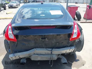 2012 Nissan 370Z z VIN JN1AZ4EH1CM564630, wystawiony jako IAAI lot #42177880 z przebiegiem 173 751 mil mil oraz . Historia ofert i sprzedaży dostępna na DreamBid. Obrazek 6.