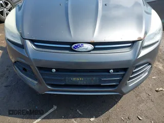 2013 Ford Escape SE with VIN 1FMCU9GX0DUA52263, listed as a IAAI auction lot 42211395 with 140,067 mi miles and . Bid and sale history available at DreamBid. Image 6.