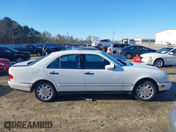 1999 Mercedes-Benz E-Class with VIN WDBJF82H0XX015778, listed as a IAAI auction lot 41269886 with 184,011 mi miles. Bid and sale history available at carsss.com. Image 13.