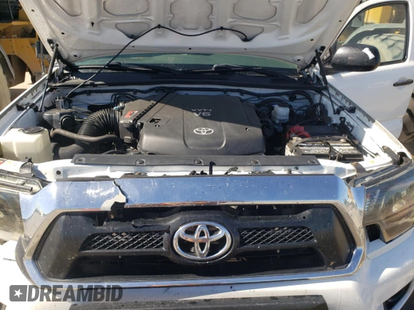 2013 Toyota Tacoma z VIN 3TMMU4FNXDM050603, wystawiony jako Copart lot #57648055 z przebiegiem 224 773 mil mil oraz Czysty tytuł • Clean title. Historia ofert i sprzedaży dostępna na DreamBid. Obrazek 11.