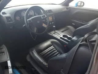 2009 Dodge Challenger R/T z VIN 2B3LJ54T29H635811, wystawiony jako Copart lot #57065925 z przebiegiem 207 261 mil mil oraz Czysty tytuł • Clean title. Historia ofert i sprzedaży dostępna na DreamBid. Obrazek 8.