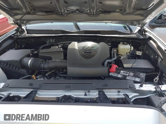2022 Toyota Tacoma SR with VIN 3TMCZ5ANXNM497511, listed as a IAAI auction lot 41670710 with 26,277 mi miles and . Bid and sale history available at DreamBid. Image 10.