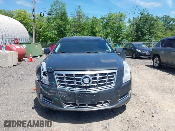 2013 Cadillac XTS Luxury z VIN 2G61R5S33D9101434, wystawiony jako IAAI lot #42290199 z przebiegiem 48 075 mil mil oraz . Historia ofert i sprzedaży dostępna na DreamBid. Obrazek 12.