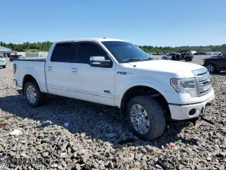 2013 Ford F-150 XLT with VIN 1FTFW1E65DFA84587, listed as a Copart auction lot 69295264 with 216,967 mi miles and Salvage Title. Bid and sale history available at carsss.com. Image 4.