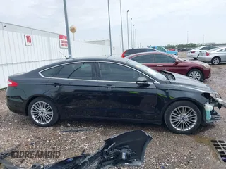 2015 Ford Fusion SE with VIN 3FA6P0H92FR205388, listed as a IAAI auction lot 41699606 with 69,597 mi miles. Bid and sale history available at carsss.com. Image 14.
