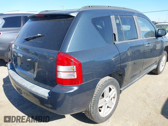 2007 Jeep Compass Sport with VIN 1J8FF47W27D110618, listed as a IAAI auction lot 42195311 with 135,128 mi miles and . Bid and sale history available at carsss.com. Image 4.