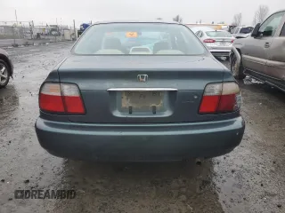 1996 Honda Accord Value with VIN 1HGCD5693TA266021, listed as a Copart auction lot 86699844 with 237,152 mi miles and Salvage Title. Bid and sale history available at DreamBid. Image 6.