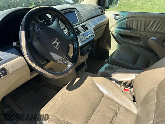 2009 Honda Odyssey Touring with VIN 5FNRL38819B025126, listed as a IAAI auction lot 42219263 with 187,191 mi miles and . Bid and sale history available at carsss.com. Image 5.