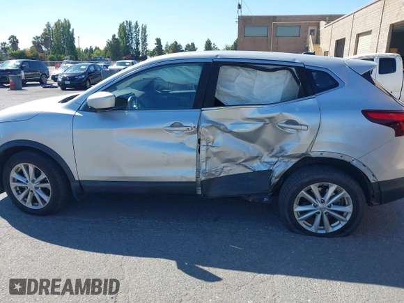 2017 Nissan Rogue SV with VIN JN1BJ1CP7HW017295, listed as a IAAI auction lot 42321408 with 84,430 mi miles and . Bid and sale history available at DreamBid. Image 14.