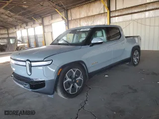 2022 Rivian R1T Adventure Package with VIN 7FCTGAAA3NN014291, listed as a Copart auction lot 76587044 with 0 mi miles and Salvage Title. Bid and sale history available at carsss.com. Image 1.